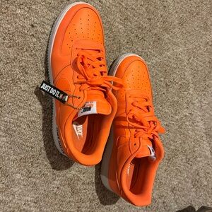 Men’s Nike Air Force 1 orange tennis shoes size 12
